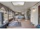 Sunroom with ample light, fitness space, and an entertainment area at 5444 Lighthouse Rd, Orlando, FL 32808