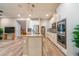 Modern kitchen featuring stainless steel appliances, a gray countertop island, and an open floor plan at 5814 Bimini Twist Loop, Orlando, FL 32819