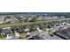 Overhead shot capturing a suburban neighborhood with solar panels, tidy streets, and neatly arranged single-Gathering homes at 5841 Bullock Pl, St Cloud, FL 34771