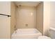 Bathroom featuring a white tub and a tiled shower at 609 Gallery Dr # 2, Winter Park, FL 32792