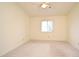 Bright bedroom featuring carpet floors, ceiling fan and natural light from window with blinds at 609 Gallery Dr # 2, Winter Park, FL 32792