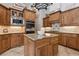 Beautiful kitchen with wooden cabinets and center island at 6424 Cartmel Ln, Windermere, FL 34786