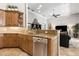 View of the kitchen with granite countertops and stainless steel appliances at 6424 Cartmel Ln, Windermere, FL 34786