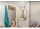 Clean and tidy bathroom with a shower, vanity, and essential amenities at 729 Secret Harbor Ln # 105, Lake Mary, FL 32746