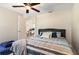 The bedroom boasts a ceiling fan and access to the kitchen/dining area at 729 Secret Harbor Ln # 105, Lake Mary, FL 32746