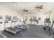 Well-equipped gym with treadmills, stationary bikes, and fitness equipment, promoting a healthy lifestyle at 729 Secret Harbor Ln # 105, Lake Mary, FL 32746