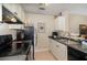 Well-organized kitchen with practical countertops, stainless steel sink and appliances at 729 Secret Harbor Ln # 105, Lake Mary, FL 32746