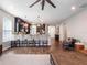 Open-concept living area with kitchen island, modern pendant lighting, and a seamless flow to the Gathering room at 753 Daybreak Pl, Longwood, FL 32750