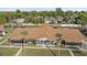An aerial view of a villa with a cozy screened-in porch and manicured front lawn at 1001 Plantation Dr # D5, Kissimmee, FL 34741