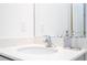 Close-up of a stylish bathroom sink with modern faucet and countertop details at 10443 Ebb Tide Ln, Orlando, FL 32821