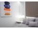 Cozy bedroom decor with modern art and stylish nightstand lamps create a relaxing atmosphere at 10443 Ebb Tide Ln, Orlando, FL 32821