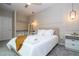 Bright bedroom featuring neutral colors and a spacious closet at 10443 Ebb Tide Ln, Orlando, FL 32821