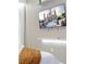 Bedroom featuring a wall-mounted television with shelving at 10443 Ebb Tide Ln, Orlando, FL 32821