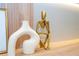 Stylish decor featuring modern sculpture and a unique vase on display at 10443 Ebb Tide Ln, Orlando, FL 32821