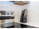 Knife set sits on a countertop next to a stainless steel range with white subway tile backsplash at 10443 Ebb Tide Ln, Orlando, FL 32821