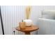 Decorated table with vase and decorations next to a plush living room sofa at 10443 Ebb Tide Ln, Orlando, FL 32821