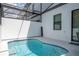 Inviting pool in a screened in area with patio at 10443 Ebb Tide Ln, Orlando, FL 32821