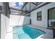Inviting pool in a screened in area with patio at 10443 Ebb Tide Ln, Orlando, FL 32821
