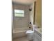 Bright renovated bathroom with modern fixtures, stylish tile, and soaking tub at 1121 Santa Anita St, Orlando, FL 32808