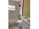 Bright renovated bathroom with modern fixtures, stylish tile, and soaking tub at 1121 Santa Anita St, Orlando, FL 32808
