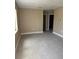 Spacious room with tiled floors and neutral colored walls with natural light at 1121 Santa Anita St, Orlando, FL 32808