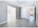 Open layout of the living room highlighting the doorways to other rooms at 11364 Cardiff Dr, Orlando, FL 32837