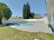 Backyard pool with patio and white fencing, offering privacy and relaxation at 11364 Cardiff Dr, Orlando, FL 32837