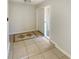 Bright entryway featuring tile flooring and a glass storm door allowing natural light at 1155 Galahad Dr, Casselberry, FL 32707