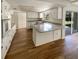 Well-lit kitchen with granite countertops and modern appliances at 1155 Galahad Dr, Casselberry, FL 32707