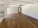 Bright living area with laminate flooring, ceiling fan, and access to the backyard at 1155 Galahad Dr, Casselberry, FL 32707