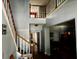 Entrance hall with wooden staircase and high ceilings at 1233 Hancock Cir, St Cloud, FL 34769