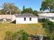 Aerial view of the backyard and neighboring properties at 13820 Adams St, Grand Island, FL 32735