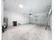 Spacious two-car garage with concrete floor at 13820 Adams St, Grand Island, FL 32735