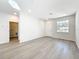 Bright, spacious living room with sleek floors and abundant natural light at 13820 Adams St, Grand Island, FL 32735