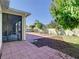 Enjoy the backyard with a brick-paved patio area and a screened-in back porch at 1421 Arbitus Cir, Oviedo, FL 32765