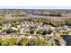 Spacious residential neighborhood featuring mature trees, waterways, and diverse single-Gathering homes at 14266 Squirrel Run, Orlando, FL 32828