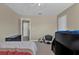 Spacious bedroom featuring carpet, a bunk bed with stairs, and a soccer ball chair at 14266 Squirrel Run, Orlando, FL 32828