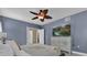 Stylish main bedroom with a ceiling fan, nice decor, and a TV at 14266 Squirrel Run, Orlando, FL 32828