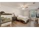 Comfortable bedroom with a ceiling fan and a window at 1570 Farrindon Cir, Lake Mary, FL 32746