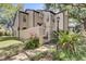 A view of the exterior of this home, highlighting the well-manicured landscaping at 1570 Farrindon Cir, Lake Mary, FL 32746