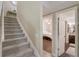 Hallway with staircase leading to bedroom and bathroom at 1570 Farrindon Cir, Lake Mary, FL 32746