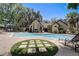 A sparkling community pool with well-maintained landscaping and ample seating for residents at 1570 Farrindon Cir, Lake Mary, FL 32746