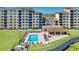 Beautiful swimming pool with lounge chairs and covered seating for residents and guests to enjoy at 16300 County Road 455 # 401, Montverde, FL 34756