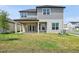 Backyard with a covered patio and exterior view of the home at 16354 Silver Grove Blvd, Winter Garden, FL 34787