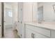 Bathroom featuring vanity with quartz countertop, tile flooring, and walk-in shower view at 16354 Silver Grove Blvd, Winter Garden, FL 34787