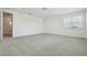 Expansive carpeted bedroom featuring recessed lighting, white walls, and natural light at 16354 Silver Grove Blvd, Winter Garden, FL 34787