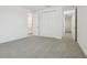 A spacious bedroom with large closet and an attached bathroom at 16354 Silver Grove Blvd, Winter Garden, FL 34787