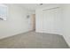 Well-lit bedroom with a closet and large window at 16354 Silver Grove Blvd, Winter Garden, FL 34787