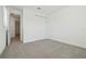 A bedroom featuring a closet and an adjacent entry at 16354 Silver Grove Blvd, Winter Garden, FL 34787