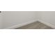 Corner view of neutral carpeting and white trim, showing flooring detail at 16354 Silver Grove Blvd, Winter Garden, FL 34787